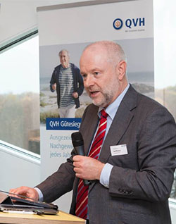 qvh-hero-people-taking-part-business-event