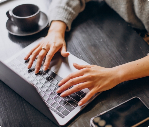 qvh-female-hands-typing-computer-keyboard